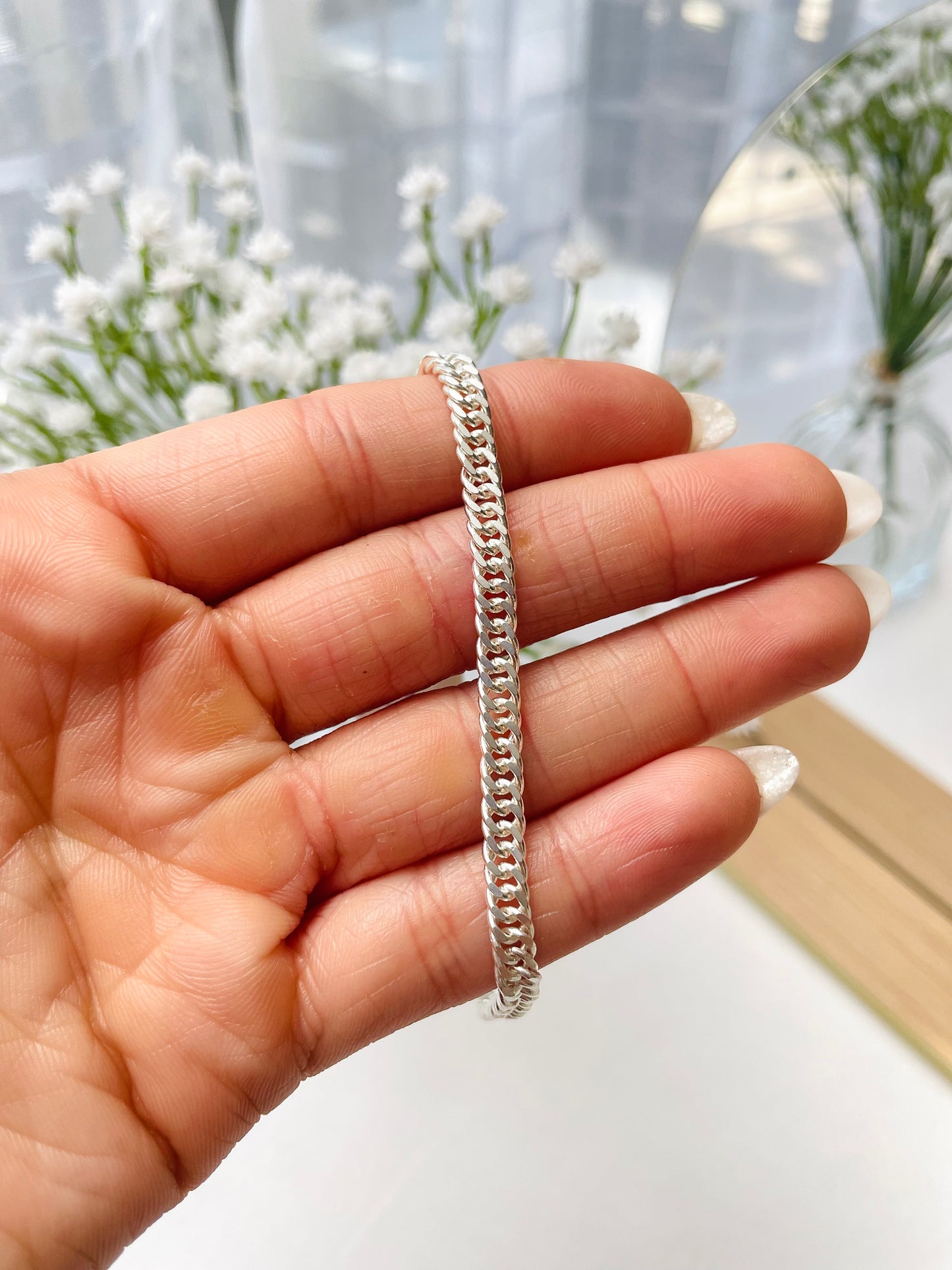 Pulsera triple grumet
