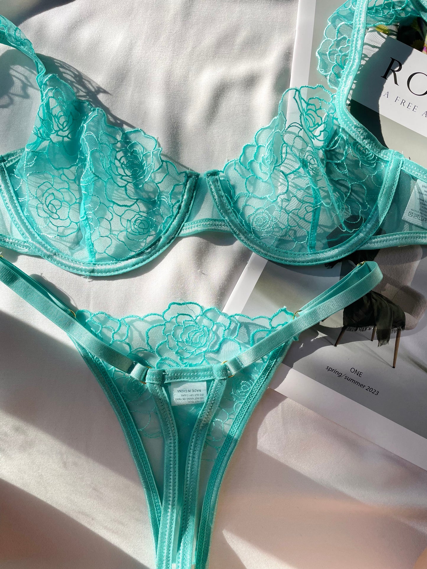 Set Rose con vuelos aguamarina