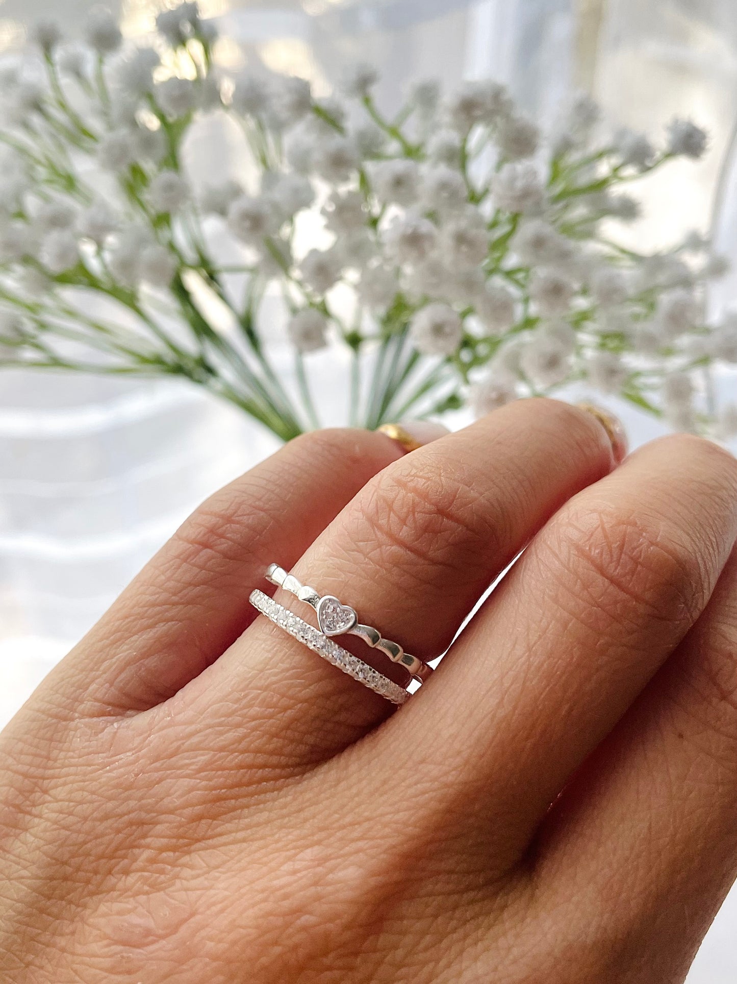 Anillo doble corazón con circones
