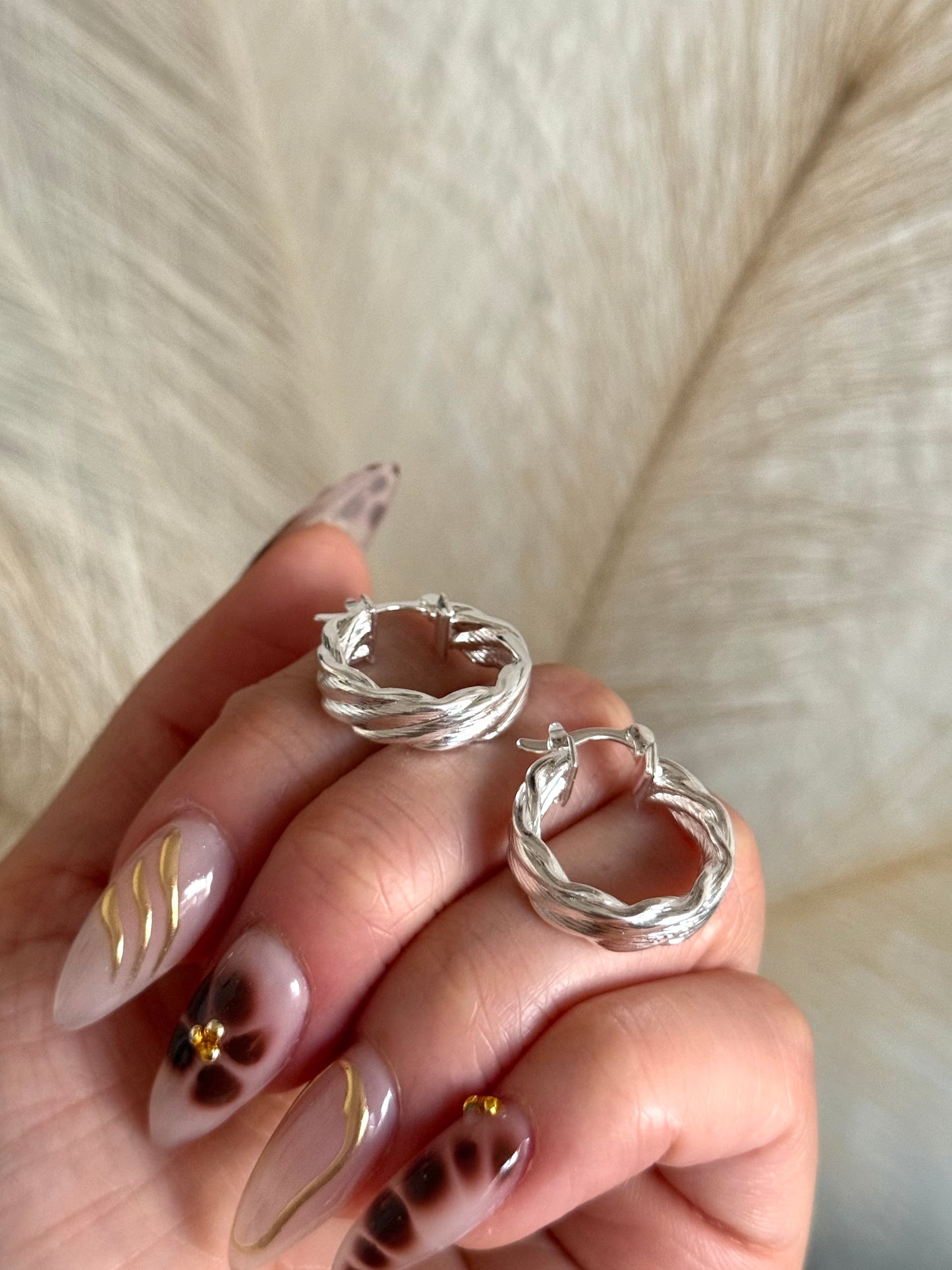Argollas trenzadas corte cuadrado