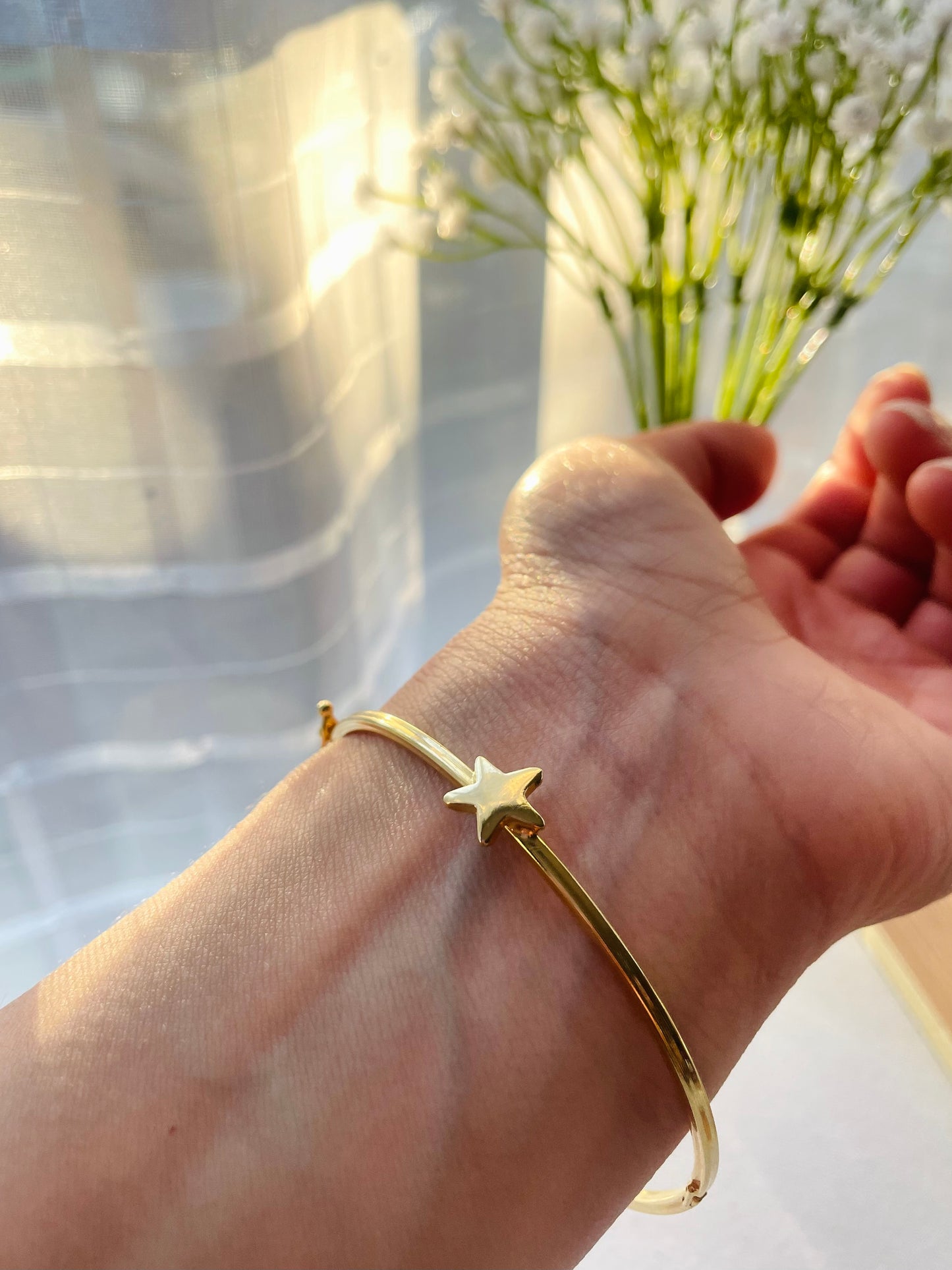 Pulsera estrella rígida